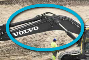Volvo excavator boom circled in blue.