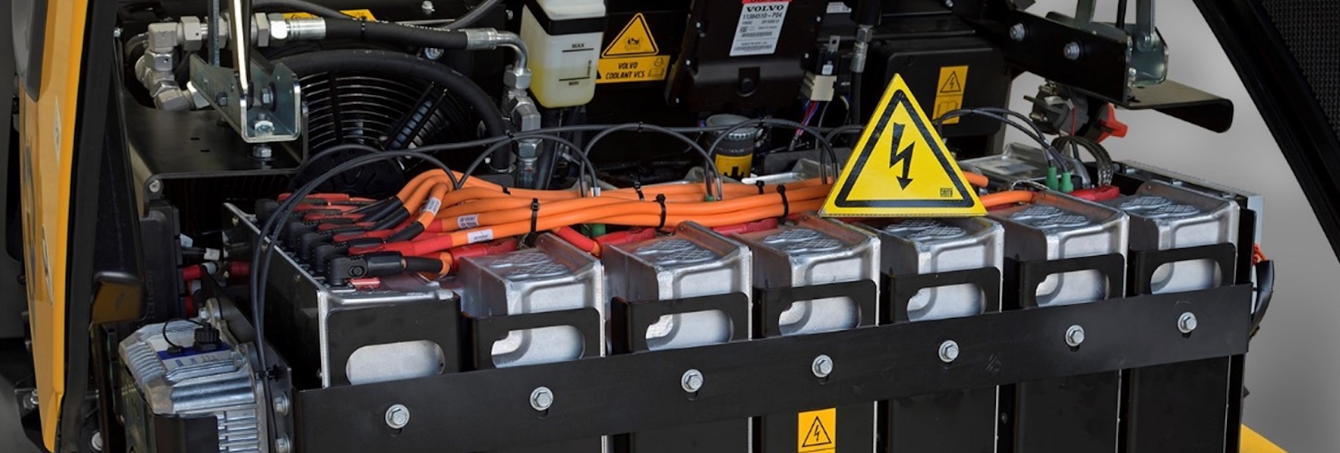 A view of the battery compartment on a Volvo compact electric machine.